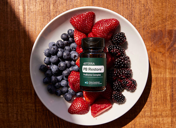 PB Restore+ over a bowl with fruit