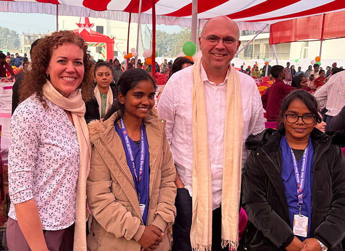Dr. Russell Osgothorpe and Tammy Pack and two women posing for a photo at the school dedication. 