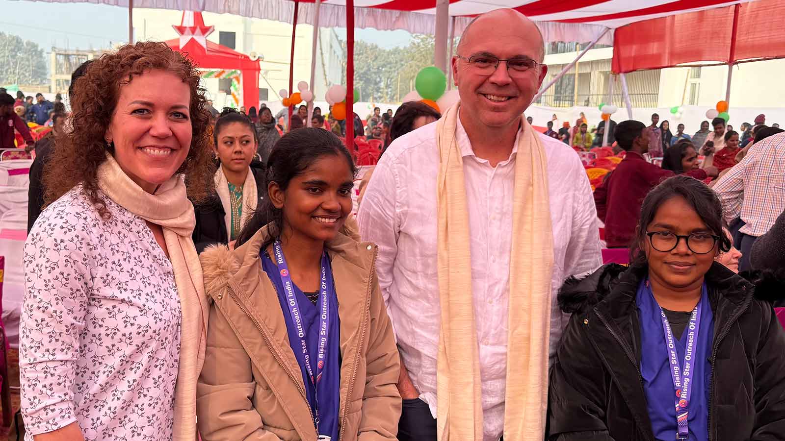 Dr. Russell Osgothorpe and Tammy Pack and two women posing for a photo at the school dedication. 