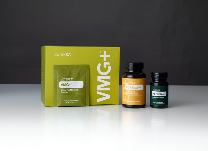 A packaging and product display of PB Restore, EO Mega+ and VMG+, with a black background.