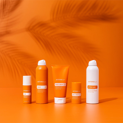 doTERRA sun line products on an orange background