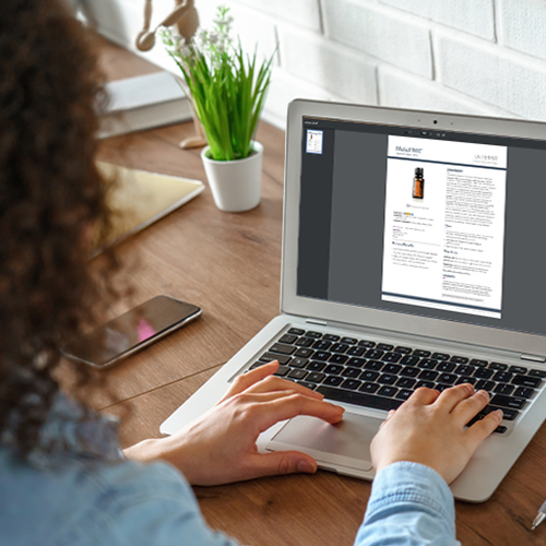 Lady taping in a computer